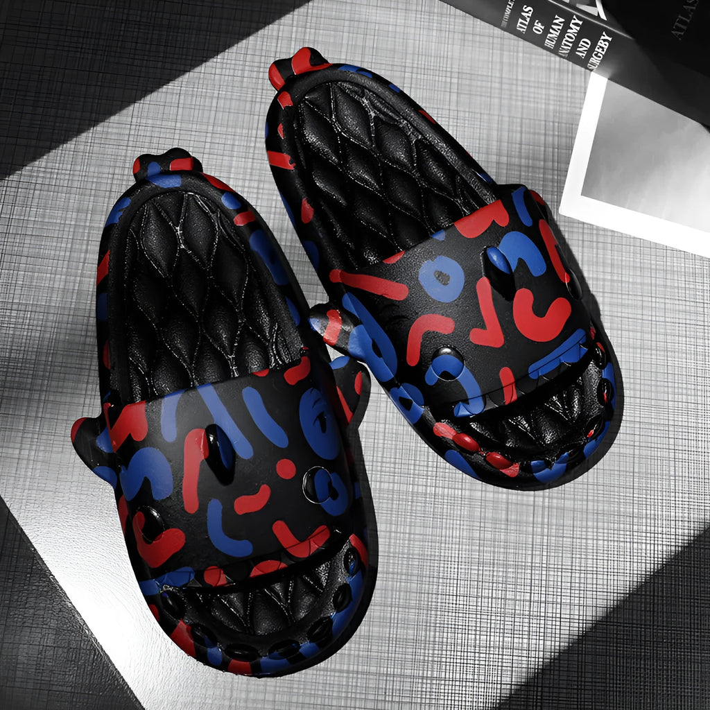 Shark design open-toe slippers in EVA material on a white background.