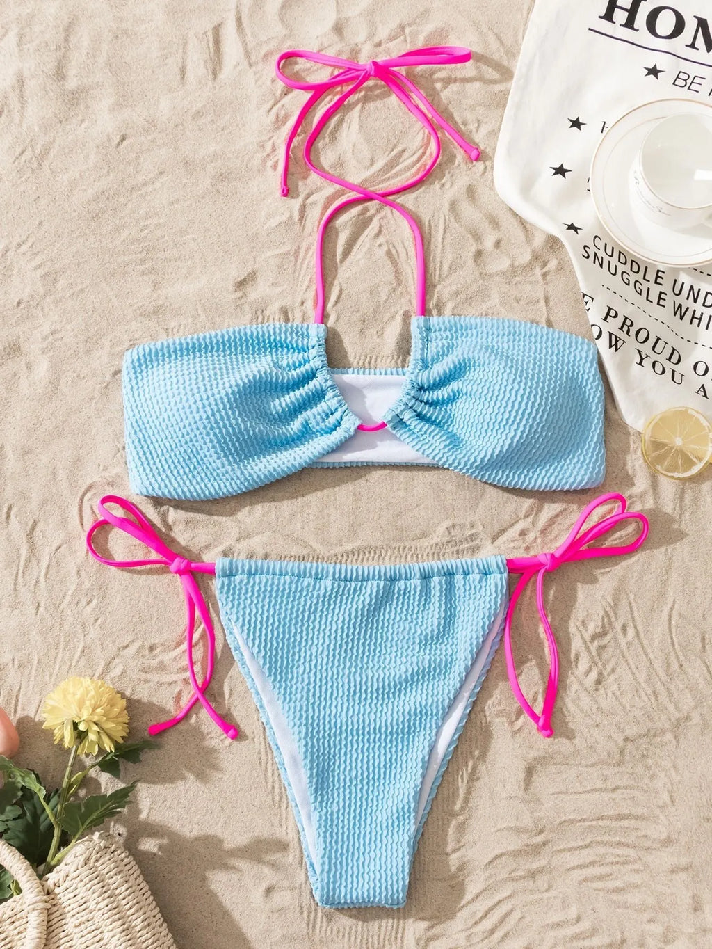 Women's two-piece halter swimsuit with lace-up back in solid colour