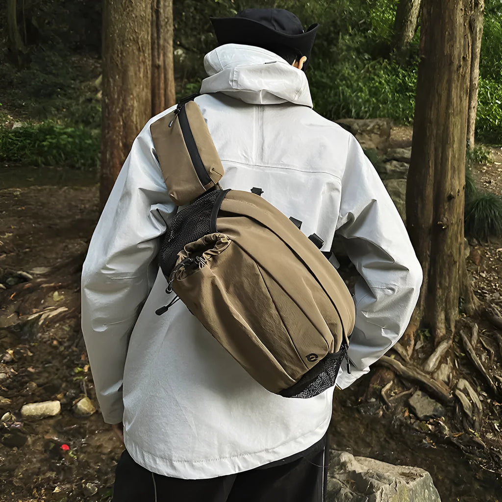 Unisex nylon waist backpack shown in Army Green colour with adjustable shoulder and waist straps.