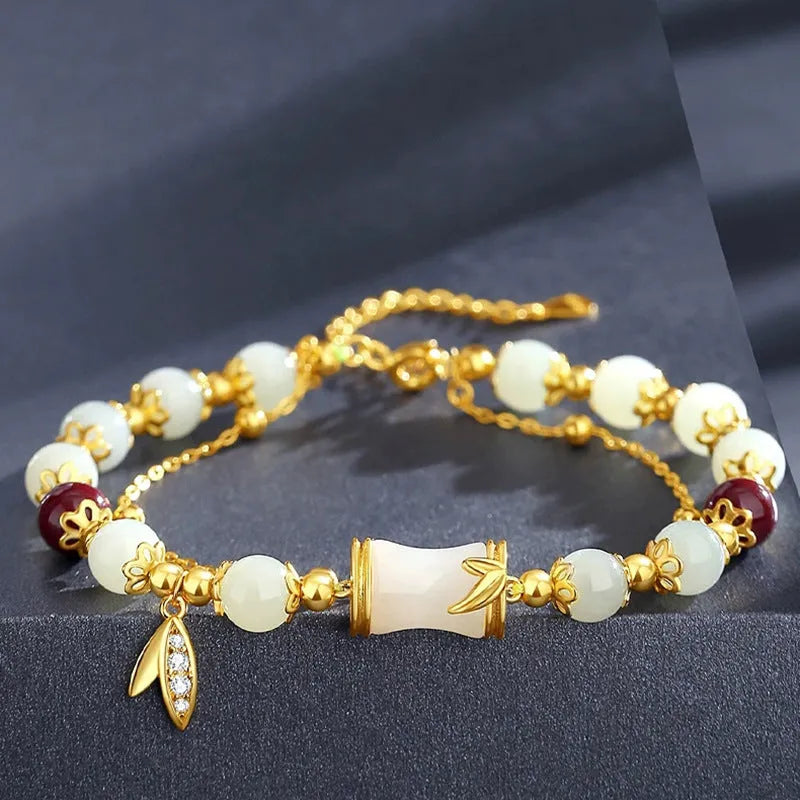 Retro glass flower bracelet with ruyi design in electroplated finish showing beige, green, light green, and white colour options