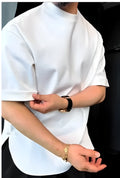 Men's white button-front t-shirt with short sleeves and a round hem on a neutral background.