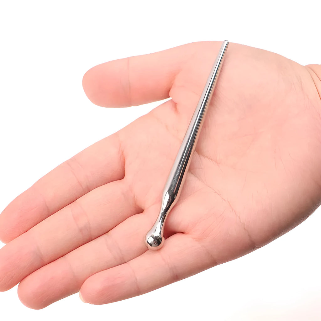 Silver metal urethral plug stick with graduated round beads and horse eye base
