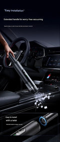 Black handheld car vacuum cleaner with green light dust detection on a car seat