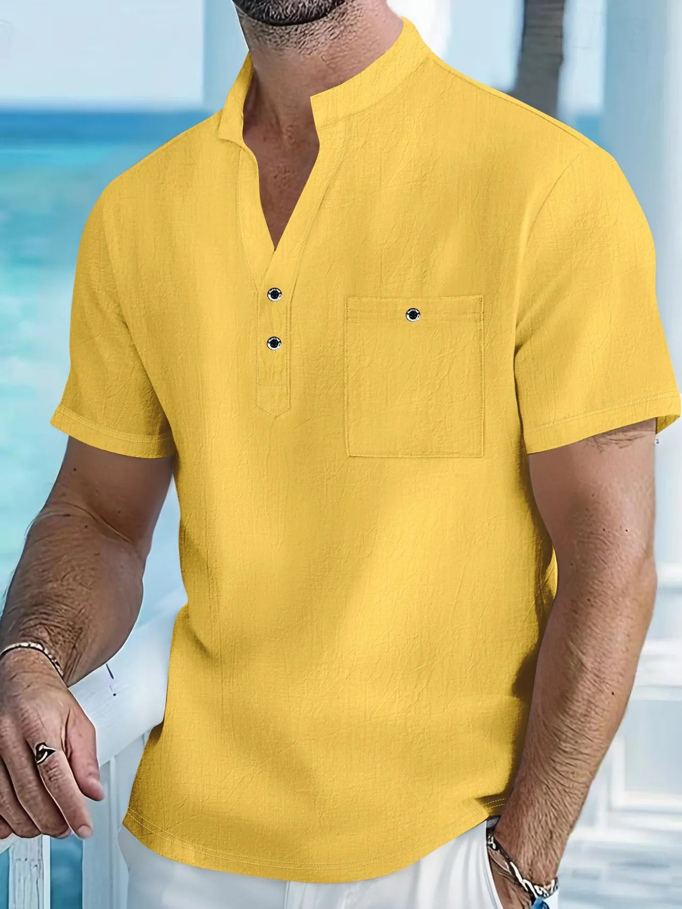 Men's loose-fit linen blend short sleeve shirt with a stand collar in a light blue colour.