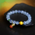 Women's aquamarine bracelet with 8mm geometric beads in iced aquamarine colour and ethnic retro style