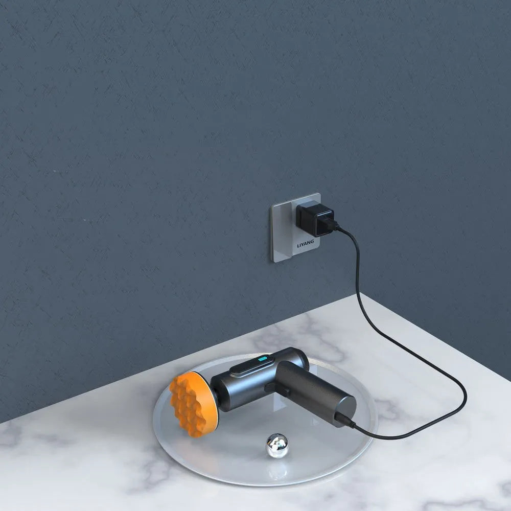 Wireless electric waxing and polishing machine with orange housing and a white polishing disc.