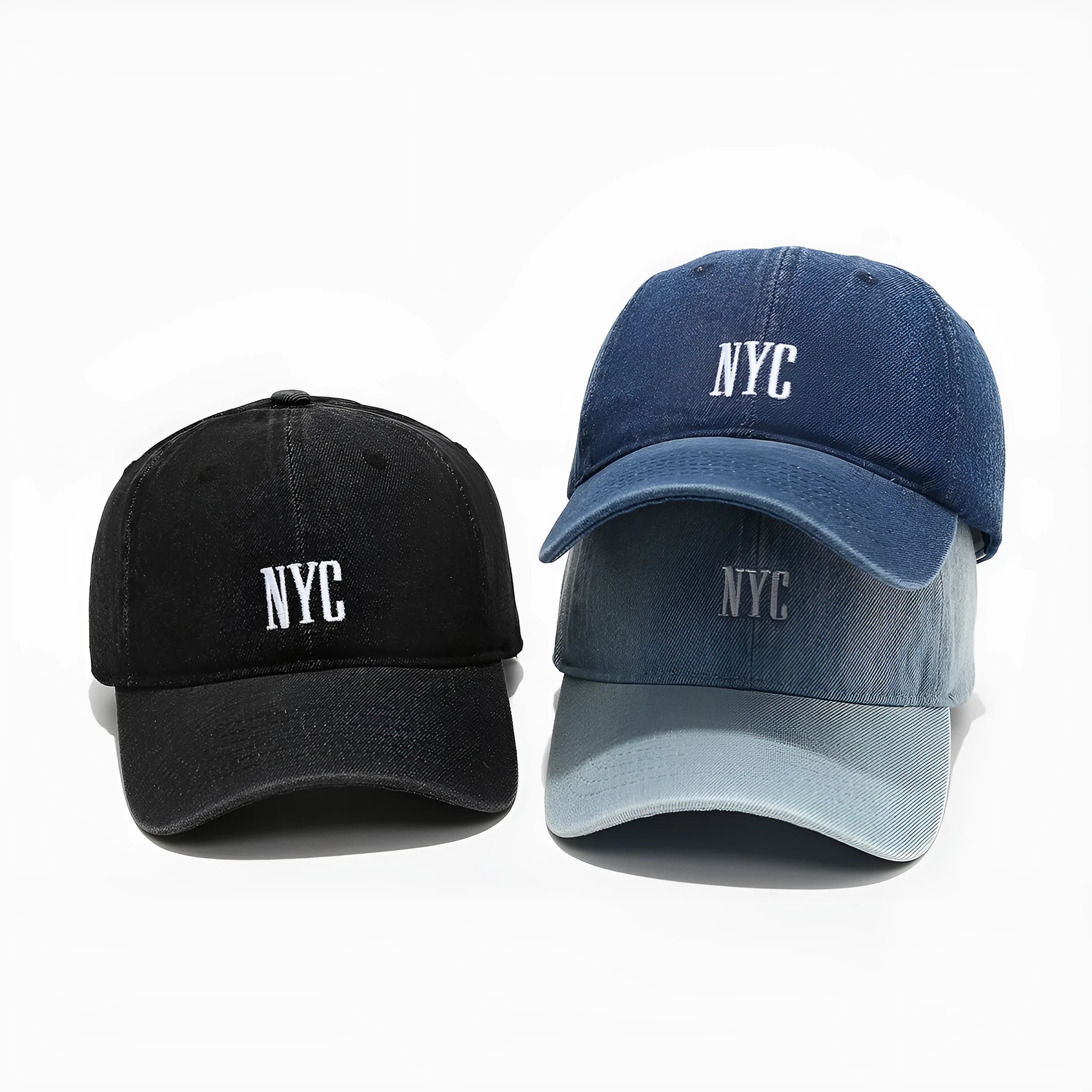 A light blue denim peaked cap with a dome crown, adjustable strap, and decorative white English letters on the front.