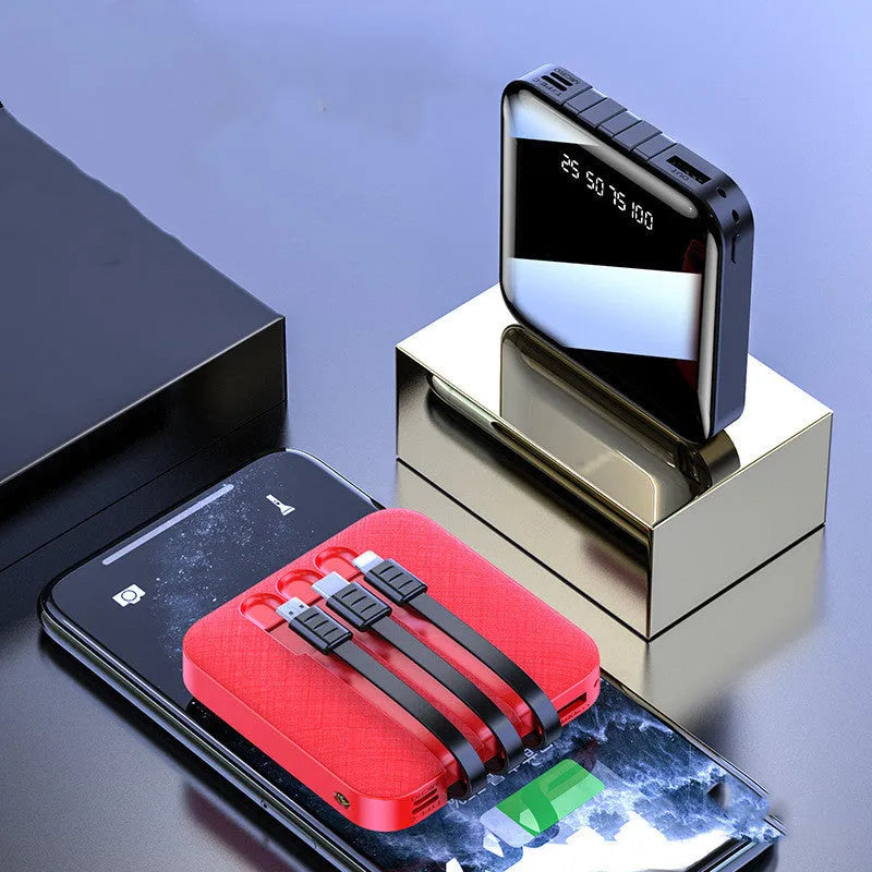 Square black power bank with a built-in white charging cable, showing compact 80mm size.