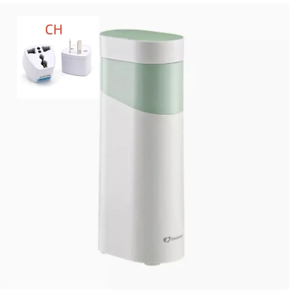 Small black or green desktop instant water dispenser with digital display and water tank.