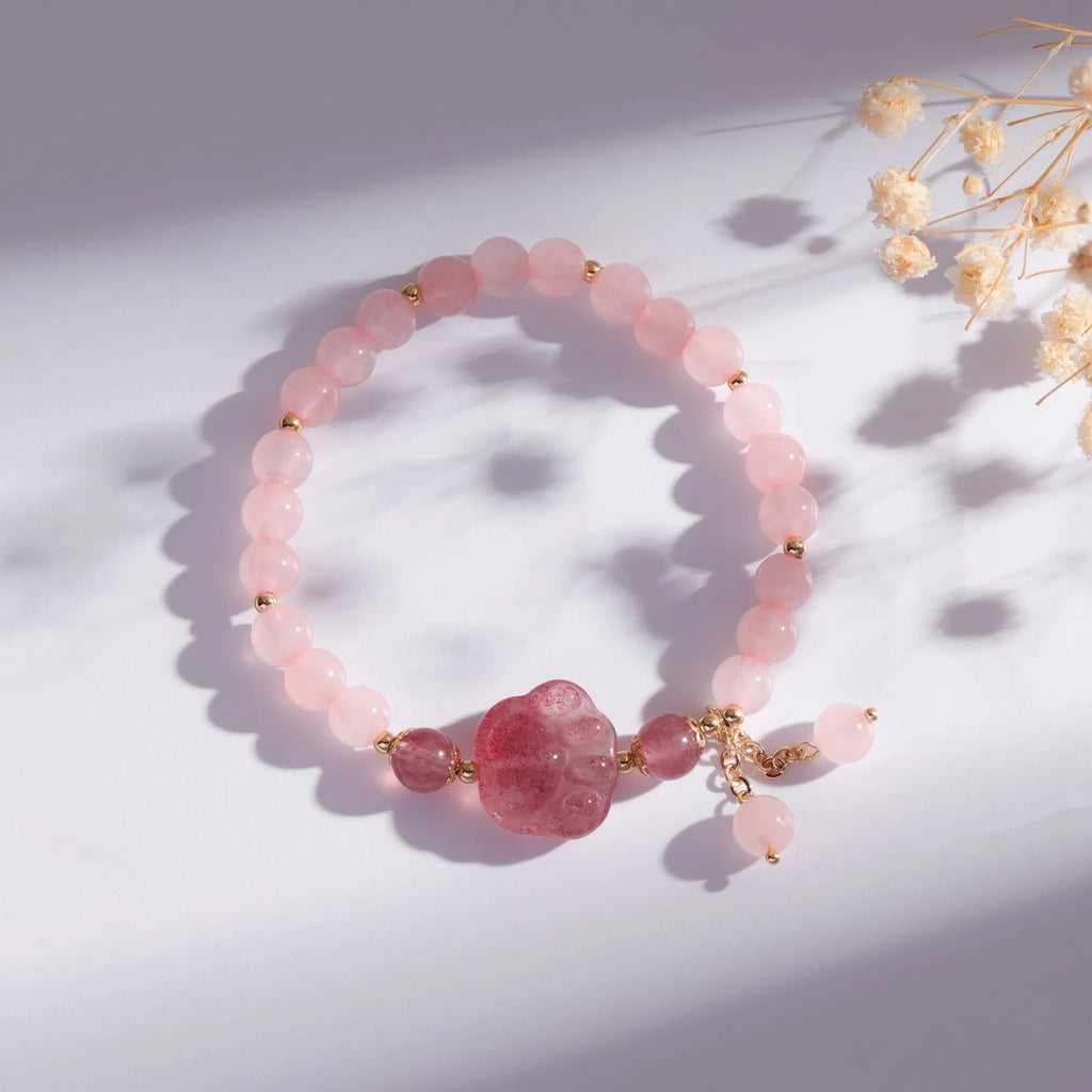 Women's natural crystal bracelet with manual craftsmanship showing animal zodiac designs