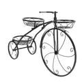 Black iron tricycle plant stand with three round basket holders for smaller planters in home, garden, or patio