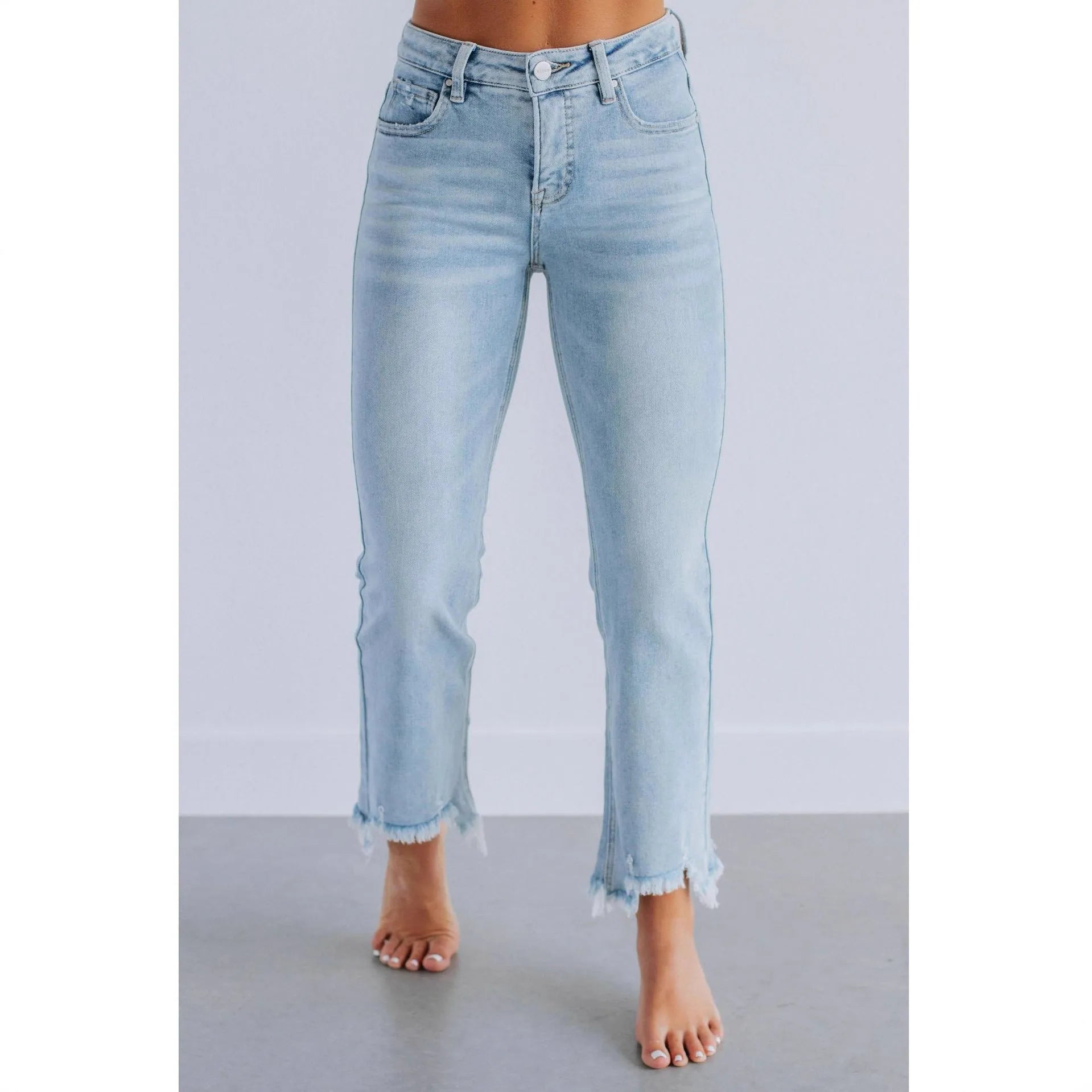 Solid colour women's cotton denim jeans with a hand-worn finish in light blue and dark blue.