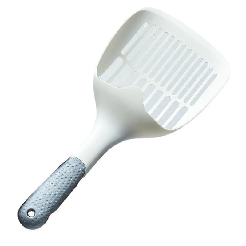 White plastic cat litter scoop with an attached rectangular base.