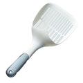 White plastic cat litter scoop with an attached rectangular base.