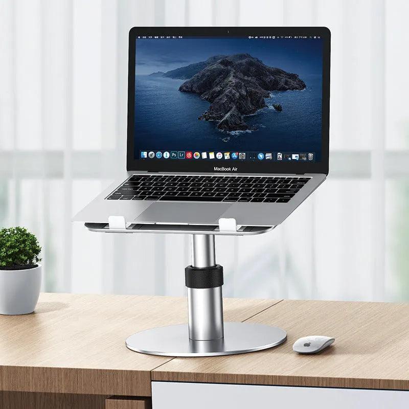 Silver aluminium car laptop stand with height adjustment and 360-degree rotating base on a car seat.