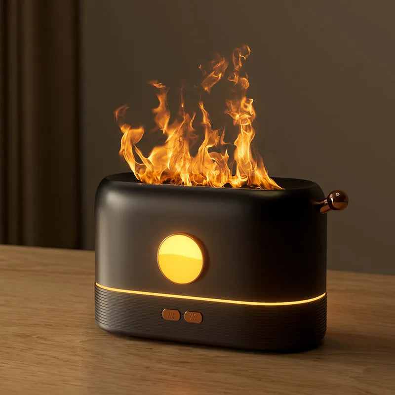 Black USB humidifier with flame simulation effect on wooden desktop