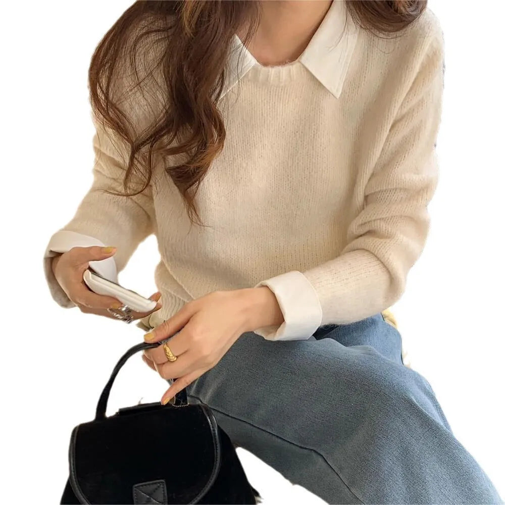 Women's loose fit knitted top with contrast colour lapels in navy blue.