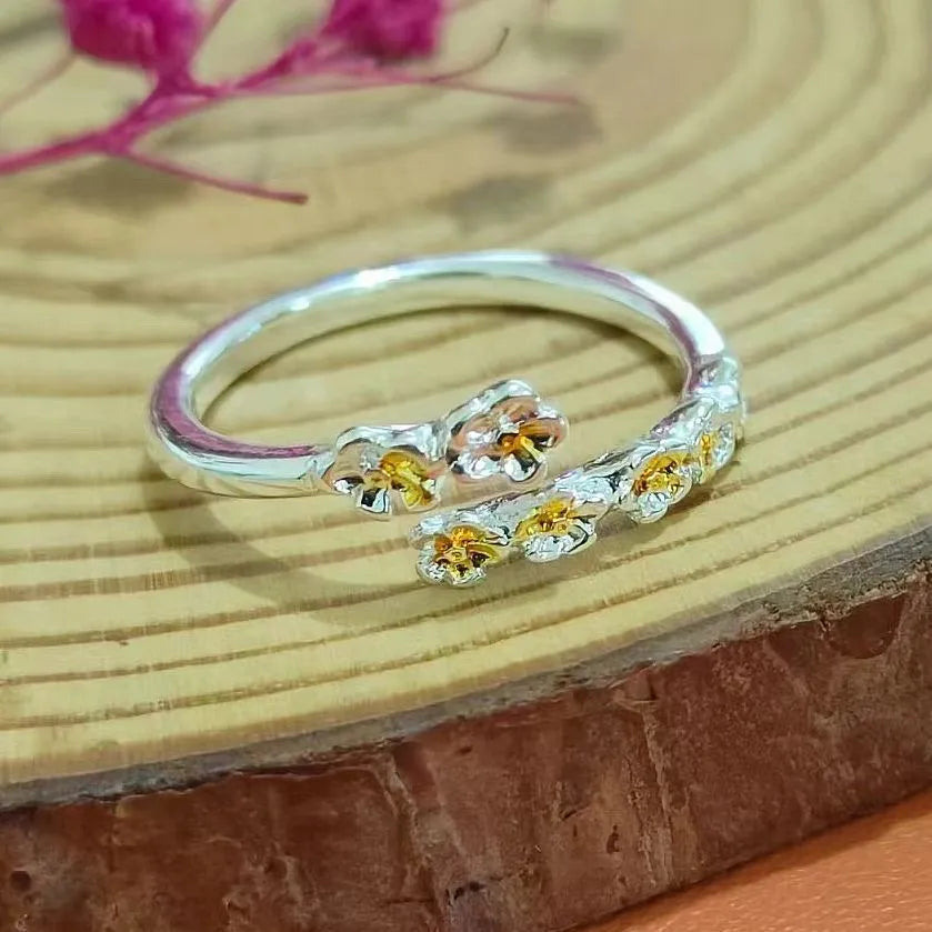 Zinc alloy camellia flower open mouth adjustable ring for women with electroplated finish