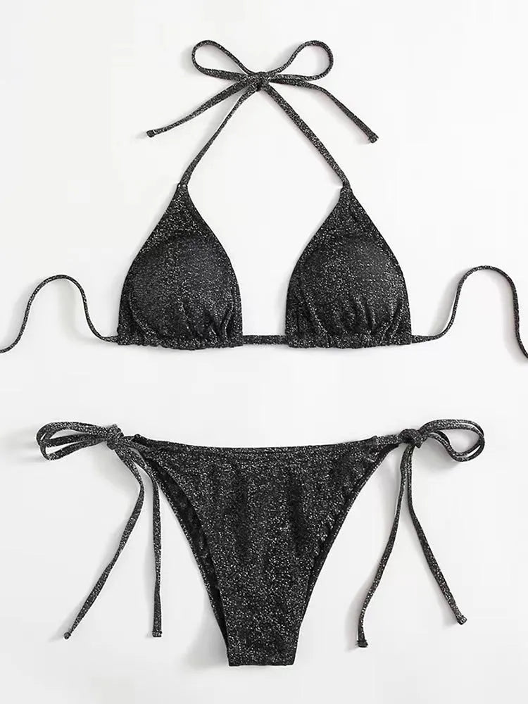 Women's split bandage style bikini swimsuit in polyester fabric on a mannequin.