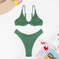 Green women's bikini suit with ruffle detail and briefs bottom