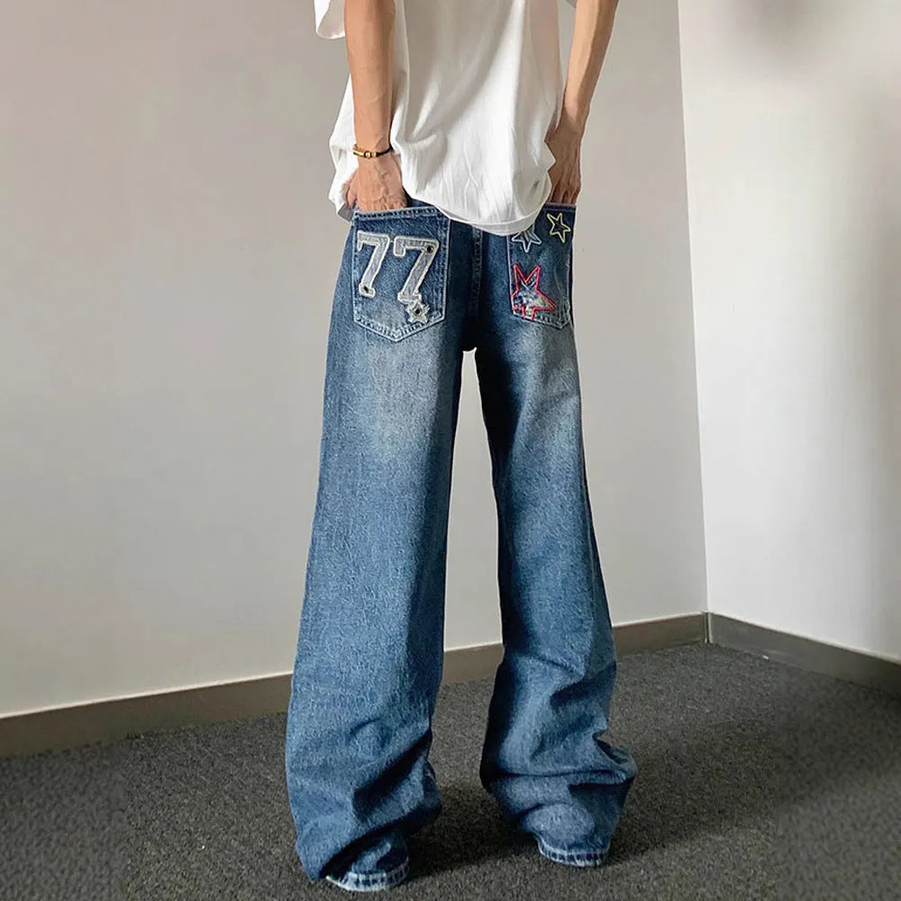 Blue designer embroidered high-waisted retro loose slimming trousers with mid waist and zip fly, sizes S to 3XL.
