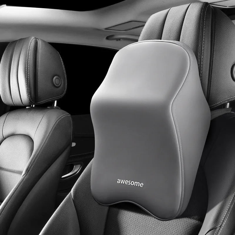 Geometric patterned memory foam car lumbar support pillow and matching headrest in grey.