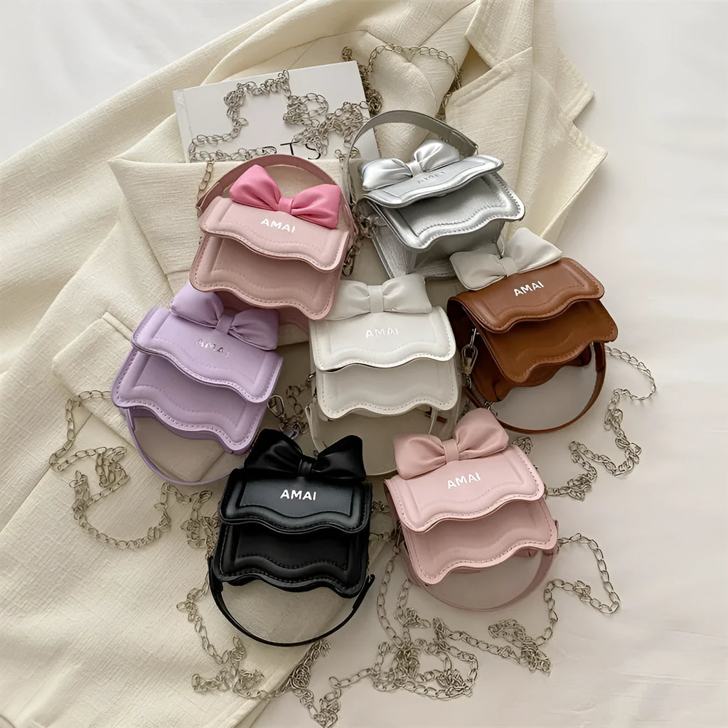 Mini crossbody bag in PU leather with adjustable strap, shown in multiple colour options