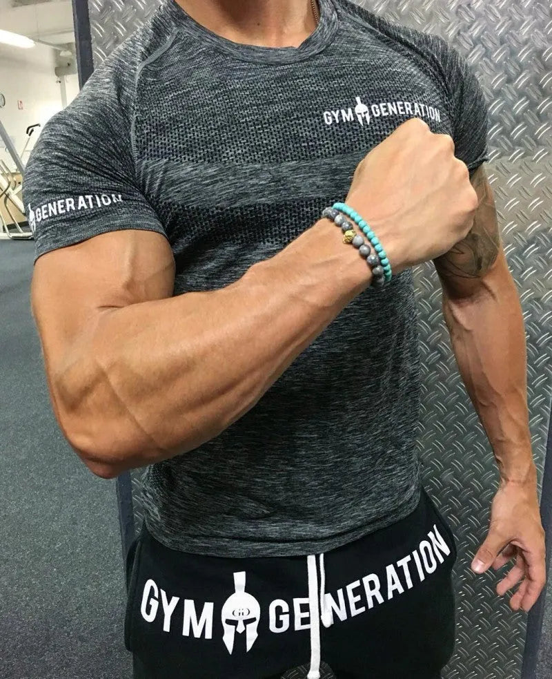 Men's short sleeve polyester workout top in orange colour for gym training