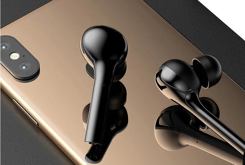 Black and white Bluetooth wireless in-ear headphones with touch controls and charging case