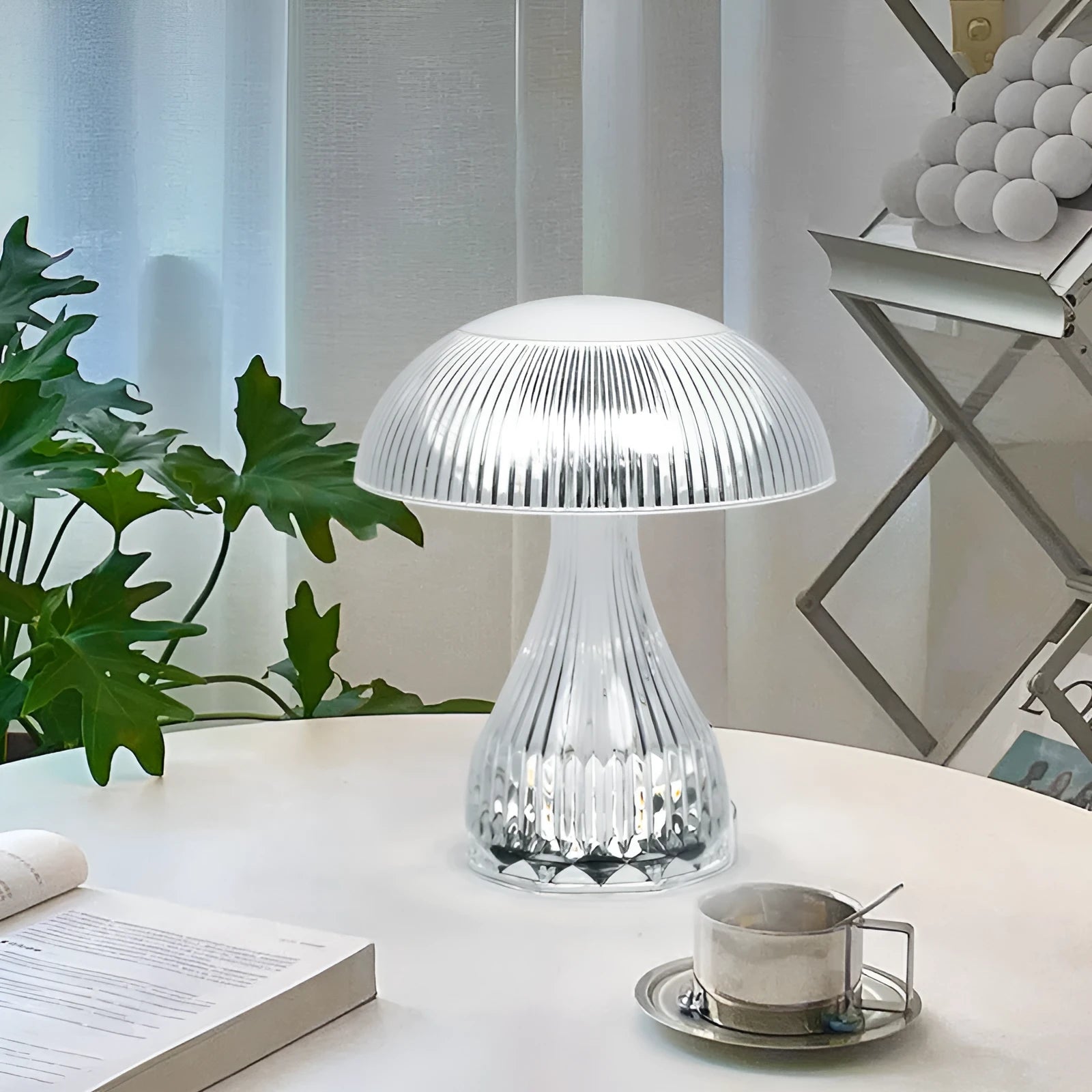 White acrylic touch night lamp with USB charging port on a wooden table.