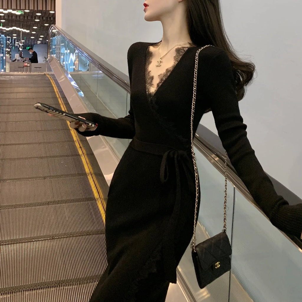 Black women's slim fit woolen skirt with a princess dress silhouette on a hanger.