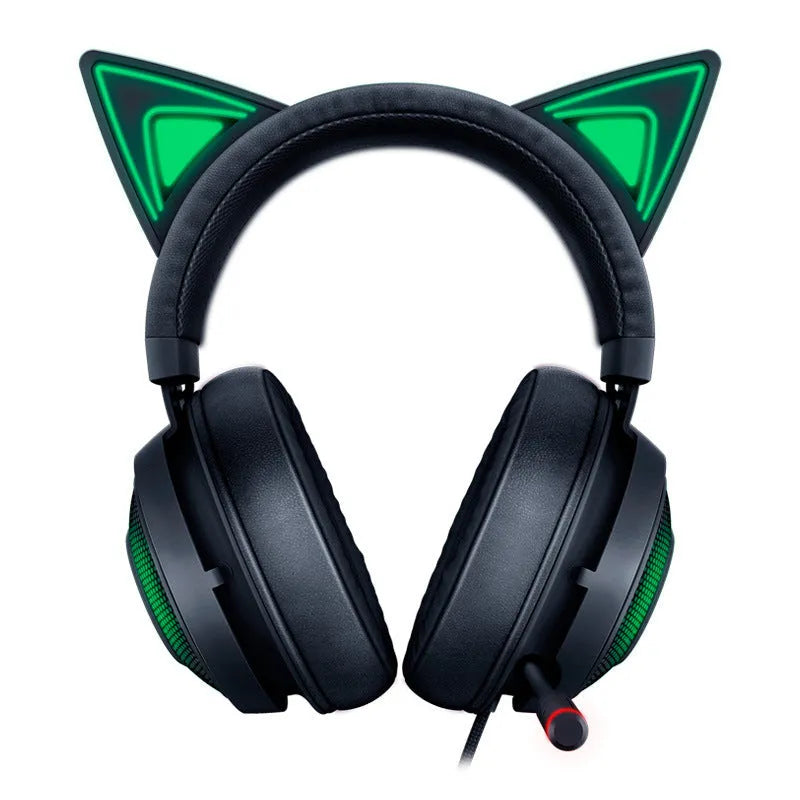 Pink glowing cat earphones with wired USB connection and head-mounted design on a desk