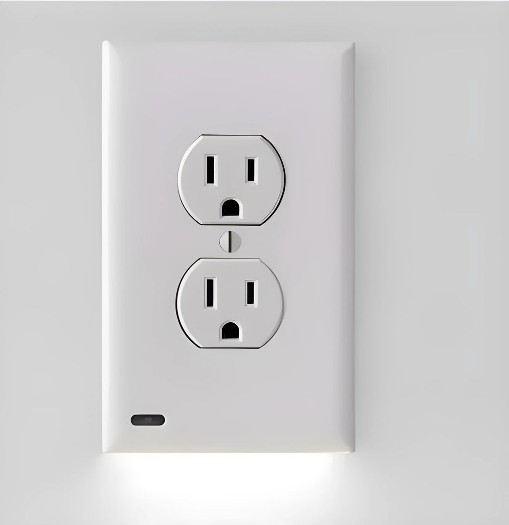 White plug-in socket night light with LED bulbs installed in a wall outlet.