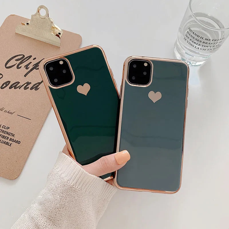 Solid colour TPU phone case for iPhone shown in blue, claret, pink and green options.