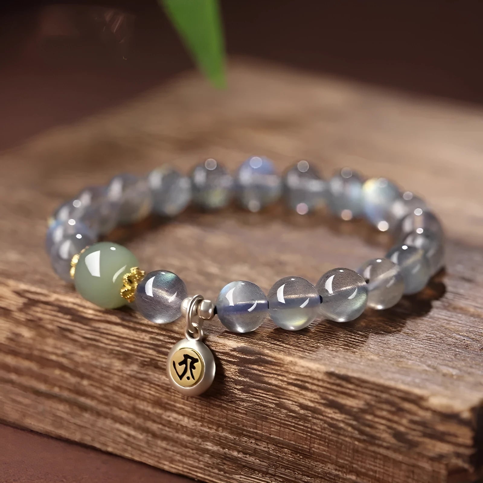 Birth Buddha Beads moonstone bracelet with Thousand-Hand Guanyin Mouse charm and electroplated finish