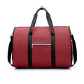 Medium cylinder travel bag in waterproof Oxford cloth, shown in black, with a zipper opening.