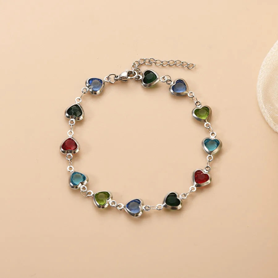 Stainless steel geometric Devil's Eye bracelet shown in one of six colour options: colourful, blue, green, red, light green, or light blue.