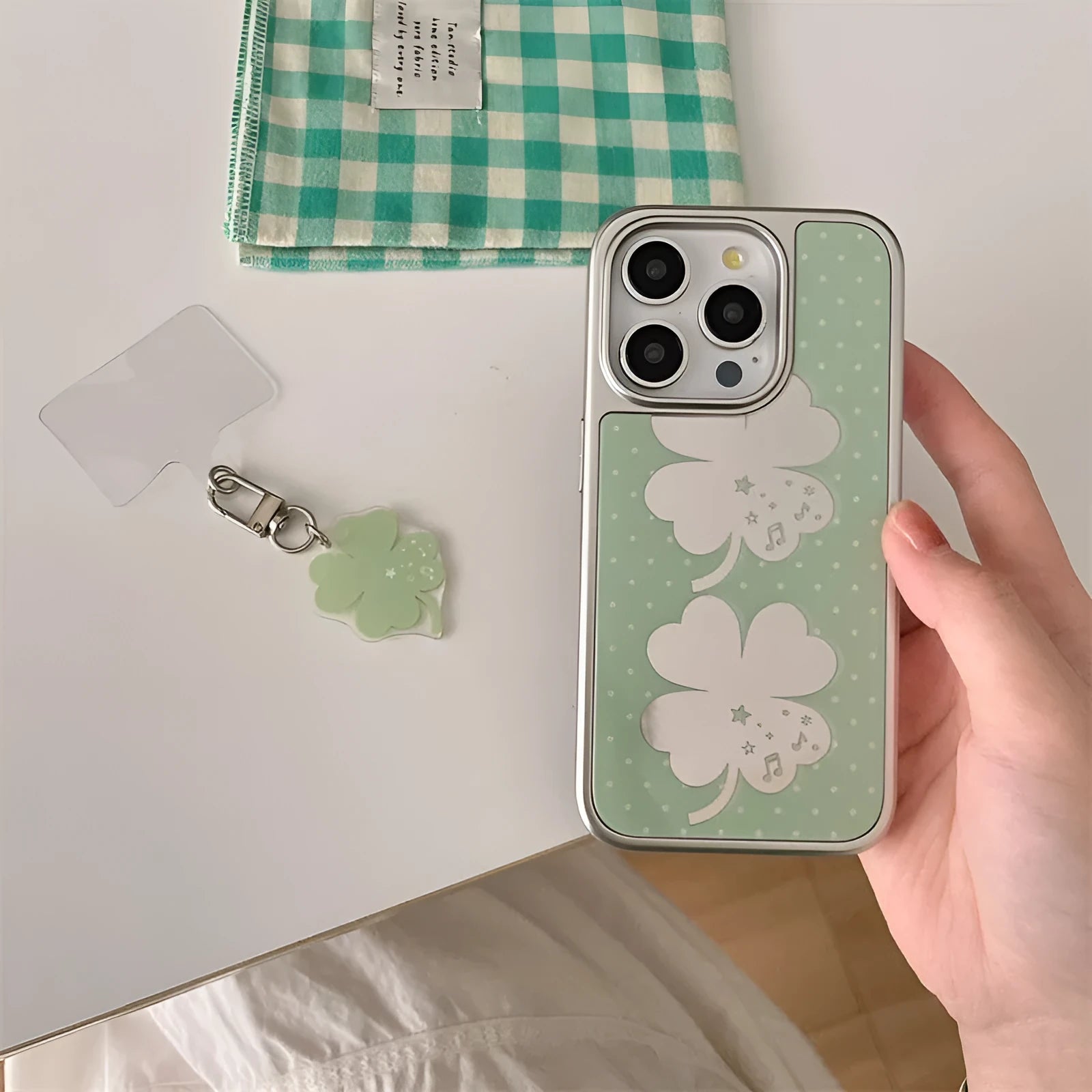 Acrylic mirror phone case with four-leaf clover pattern for iPhone 16 Pro Max