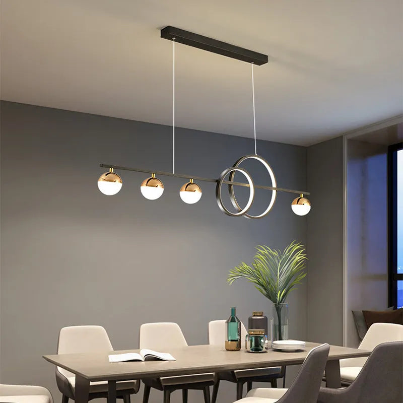 Modern rectangular aluminium ceiling lamp in black or gold with remote control for dimming.