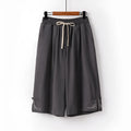 Women's apricot wide leg linen shorts with elastic waist on a hanger