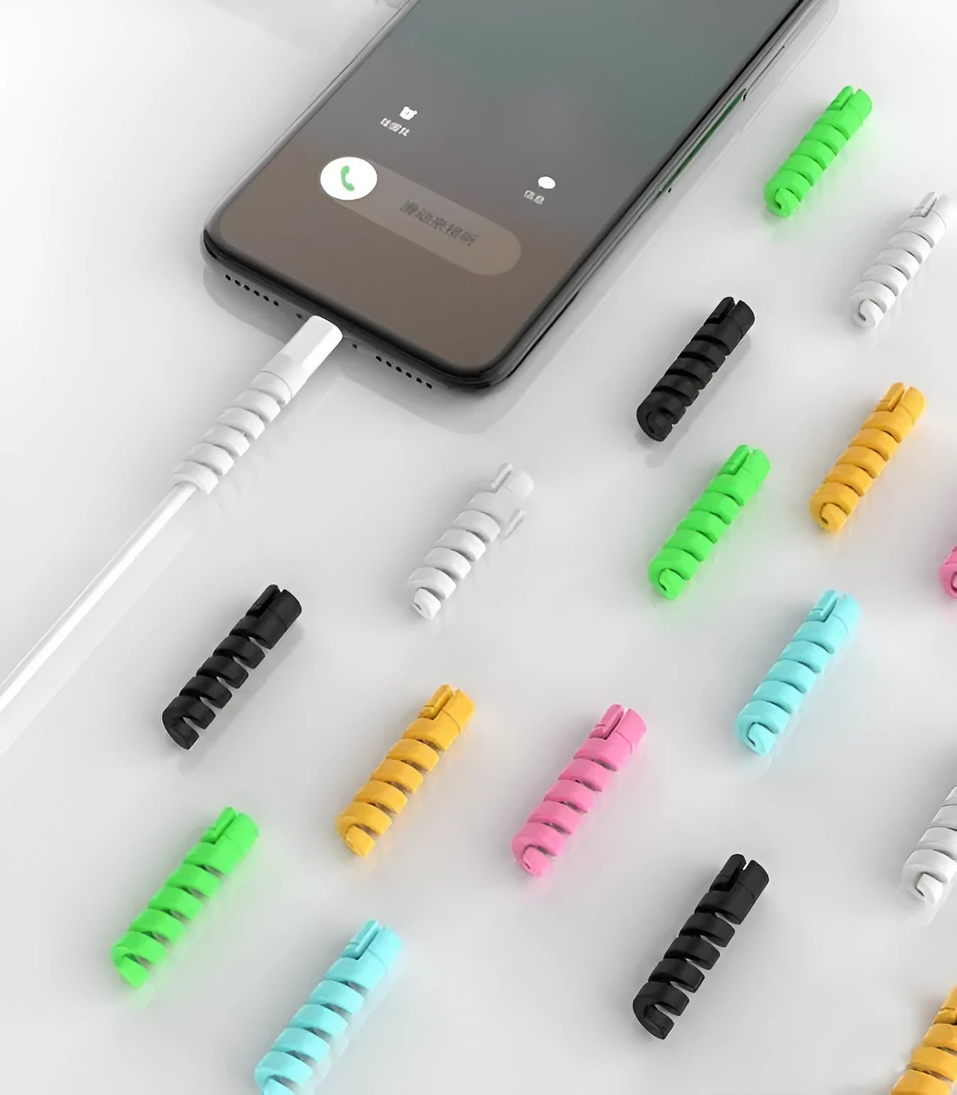 Plastic charging cable protector, 3.5cm long, shown in multiple colour options.