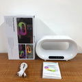 White 3-in-1 LED night light with wireless charging pad and alarm clock display