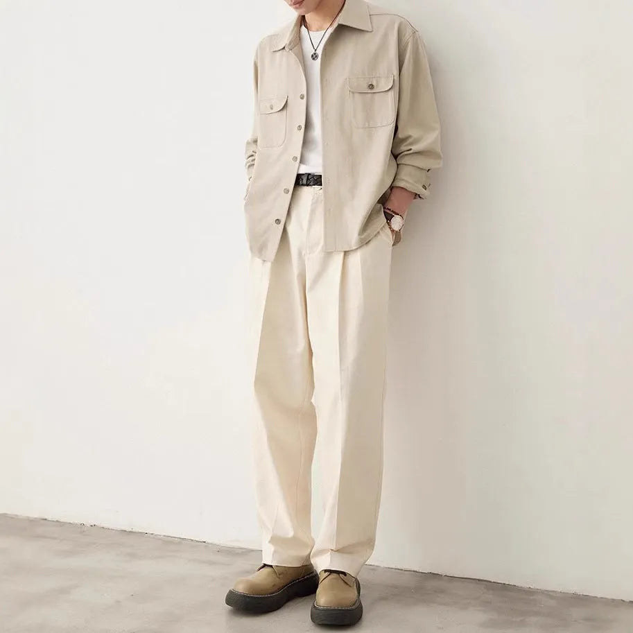 Men's simple lapel casual shirt in light sand rice colour, showing long sleeves and front button placket.