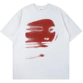 White loose fit cotton short sleeve t-shirt with a round neck on a hanger.