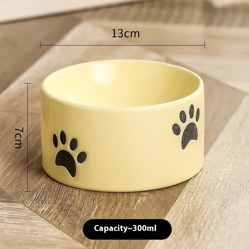 Ceramic cat bowl with neck protection design and cat's paw pattern in selected colour
