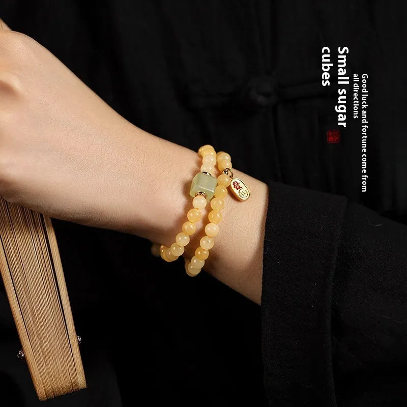 Women's Topaz bracelet with six-word mantra barrel beads and square sugar jade beads