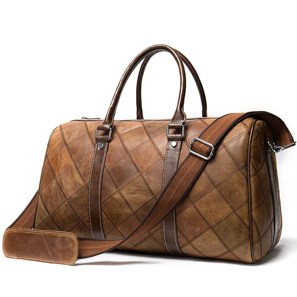 Men's brown leather duffel bag with a single strap and internal organiser pockets
