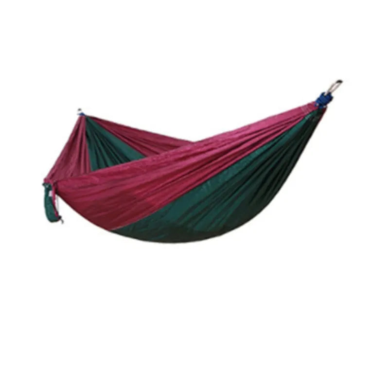 Double widened camping hammock 275x140cm in 210T nylon parachute fabric with steel buckles and ropes, shown outdoors in a garden setting