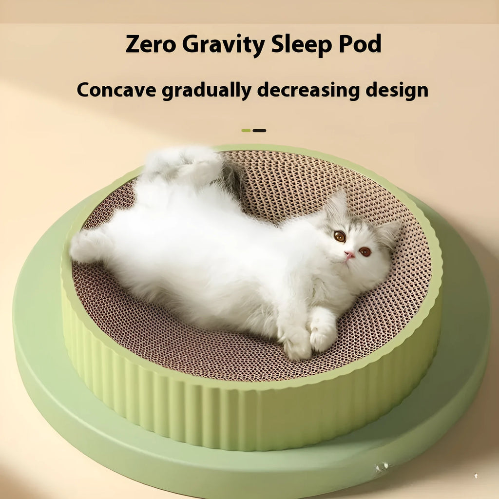 Round green and white corrugated paper cat scratching board and bed, 55cm diameter.