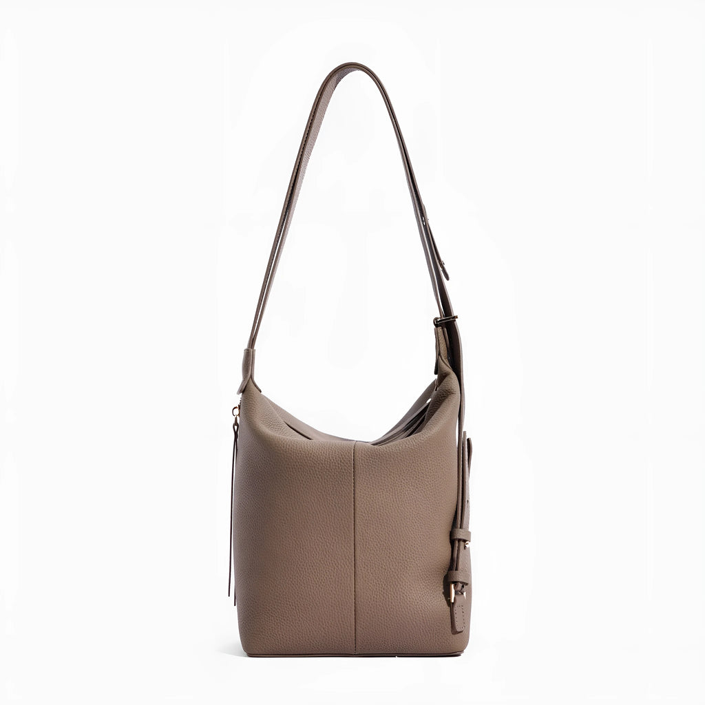 Women's soft genuine leather large bucket bag in elephant grey colour showing bucket silhouette and shoulder strap